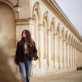 young-caucasian-female-walking-a